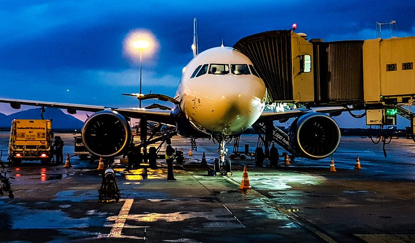 Aeroplane at gate with jet bridge attached